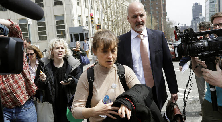 Actress Allison Mack leaves Brooklyn federal court, April 8, 2019, in New York. Actress Allison Mack leaves Brooklyn federal court.