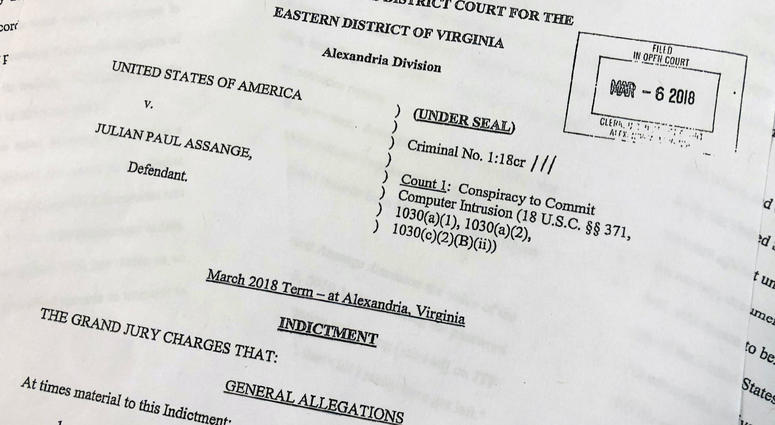 The Grand Jury Indictment against Julian Assange, released by the U.S. Department of Justice, Thursday, April 11, 2019, is photographed in Washington. The Grand Jury Indictment against Julian Assange, released by the U.S. Department of Justice, Thursday, April 11, 2019, is photographed in Washington.