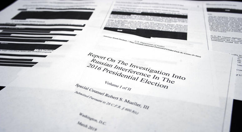 Four pages of special counsel Robert Mueller report on the witness table in the House Intelligence Committee hearing room on Capitol Hill, in Washington, Thursday, April 18, 2019. Mueller report