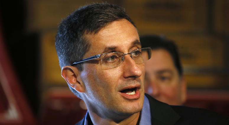 In this Sept. 5, 2014, file photo, H.J. Heinz Company CEO Bernardo Hees speaks at the preview for the opening of the H.J Heinz Co. exhibition at the Senator John Heinz History Center in Pittsburgh. Former Kraft Heinz CEO Bernardo Hees