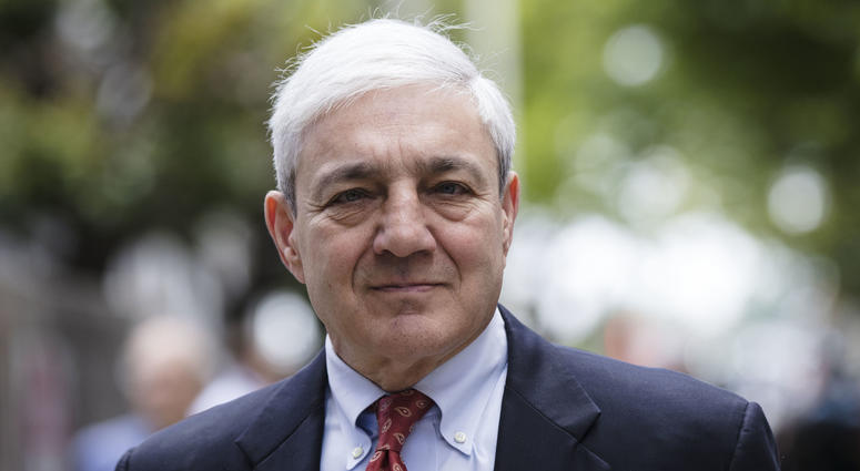 In this June 2, 2017, file photo, former Penn State President Graham Spanier departs after his sentencing hearing at the Dauphin County Courthouse in Harrisburg, Pa. Former Penn State President Graham Spanier