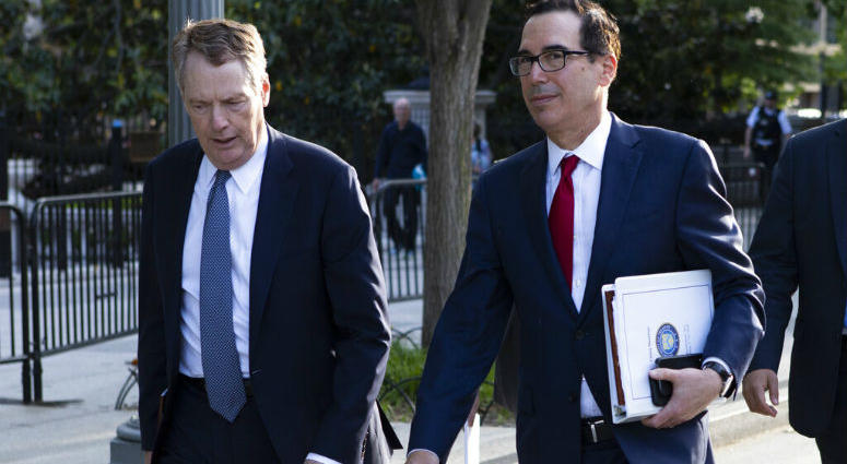 United States Trade Representative Robert Lighthizer, left, and Treasury Secretary Steven Mnuchin walk on Pennsylvania Avenue back to the White House after meeting with Chinese Vice Premier Liu He for trade talks Thursday, May 9, 2019, in Washington. United States Trade Representative Robert Lighthizer, left, and Treasury Secretary Steven Mnuchin walk on Pennsylvania Avenue back to the White House after meeting with Chinese Vice Premier Liu He for trade talks Thursday, May 9, 2019, in Washington.