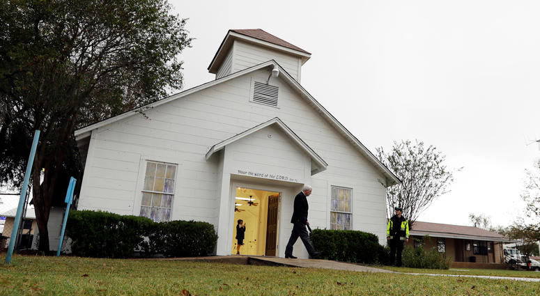 In this Nov. 12, 2017, file photo, a man walks out of the memorial for the victims of a shooting at Sutherland Springs First Baptist Church in Sutherland Springs, Texas. First Baptist Church in Sutherland Springs, Texas.