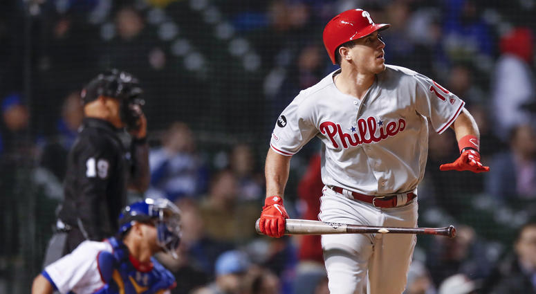 Philadelphia Phillies' J.T. Realmuto watches his solo home run against the Chicago Cubs during the 10th inning of a baseball game, Monday, May 20, 2019, in Chicago. Philadelphia Phillies' J.T. Realmuto