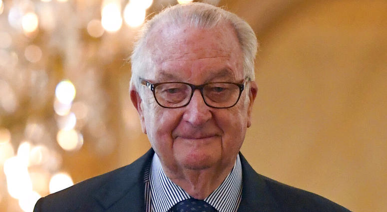 FILE - In this May 22, 2016, file photo, former Belgian King Albert II arrives for a tribute ceremony at the Royal Palace in Brussels for the victims of the Brussels attacks. Belgium’s former monarch Albert II has agreed to a DNA test demanded by a woman who claims to be his love child. King Albert II, who abdicated in 2013 for health reasons, is facing a daily fine of 5,000 euros ($5,600) for failing to provide his DNA in the