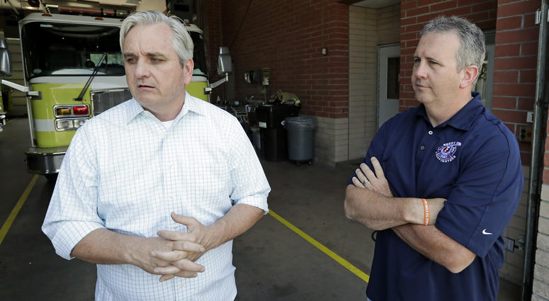 In this Tuesday, May 28, 2019 photo, Timothy Stromsnes, left, president of the Reedy Creek Professional Firefighters, Local 2117 and union vice president Sean Pierce air concerns about the firefighting staff at Walt Disney World in Lake Buena Vista, Fla. Disney firefirghters