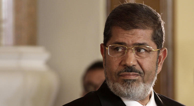 In this July 13, 2012 photo, Egyptian President Mohammed Morsi holds a news conference with Tunisian President Moncef Marzouki, at the Presidential palace in Cairo, Egypt. Egyptian President Mohammed Morsi