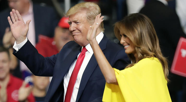 President Donald Trump and first lady Melania Trump greet supporters after formally announcing his 2020 re-election bid Tuesday, June 18, 2019, in Orlando, Fla. President Donald Trump and first lady Melania Trump