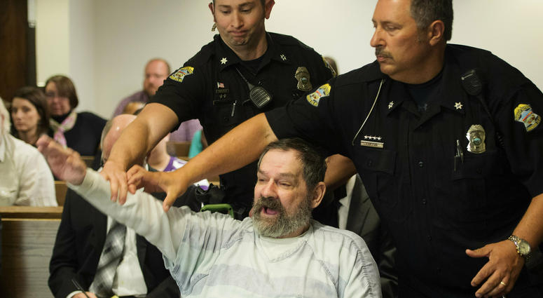 In this Nov. 10, 2015, Frazier Glenn Miller Jr., convicted of capital murder, attempted murder and other charges, gestures as Johnson County deputies remove Miller from the courtroom during the sentencing phase of his trial. Frazier Glenn Miller Jr.