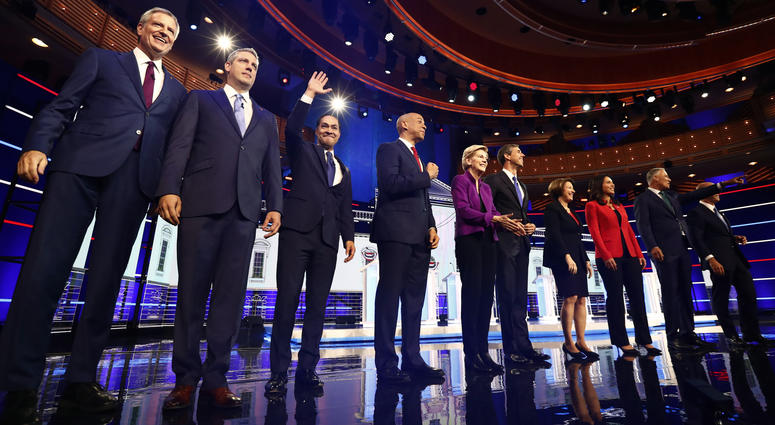 From left, Bill de Blasio, Tim Ryan, Julian Castro, Cory Booker, Elizabeth Warren, Beto O’Rourke, Amy Klobuchar, Tulsi Gabbard, Jay Inslee, John Delaney are shown on stage before the start of a Democratic primary debate, Wednesday, June 26, 2019. From left, Bill de Blasio, Tim Ryan, Julian Castro, Cory Booker, Elizabeth Warren, Beto O’Rourke, Amy Klobuchar, Tulsi Gabbard, Jay Inslee, John Delaney are shown on stage before the start of a Democratic primary debate, Wednesday, June 26, 2019.