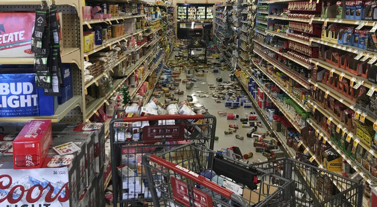 In this photo provided by Adam Graehl, food and other merchandise lies on the floor at the Stater Bros. on China Lake Blvd., after an earthquake, Thursday, July 4, 2019, in Ridgecrest, Calif. California earthquake