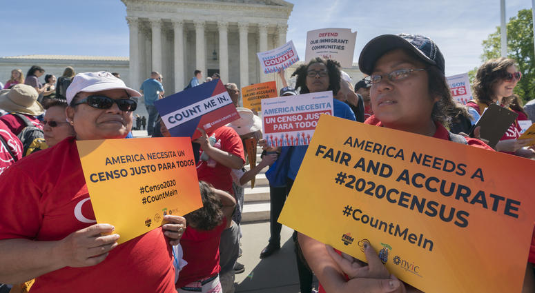 In this April 23, 2019 file photo, immigration activists rally outside the Supreme Court as the justices hear arguments over the Trump administration's plan to ask about citizenship on the 2020 census, in Washington. In this April 23, 2019 file photo, immigration activists rally outside the Supreme Court as the justices hear arguments over the Trump administration's plan to ask about citizenship on the 2020 census, in Washington.