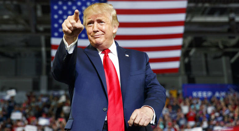 President Donald Trump gestures to the crowd as he arrives to speak at a campaign rally at Williams Arena in Greenville, N.C., Wednesday, July 17, 2019. President Donald Trump gestures to the crowd as he arrives to speak at a campaign rally at Williams Arena in Greenville, N.C., Wednesday, July 17, 2019.