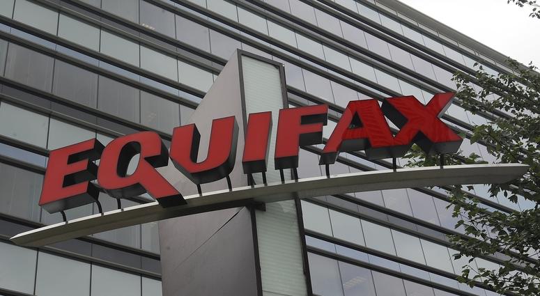 This file photo shows the corporate headquarters of Equifax Inc., in Atlanta. Equifax will pay up to $700 million to settle with the FTC and others over a 2017 data breach that exposed Social Security numbers and other information of nearly 150 million. Equifax