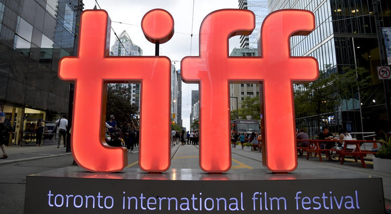 In this Thursday, Sept. 6, 2018, file photo, a view of a festival sign appears on Day 1 of the Toronto International Film Festival in Toronto. In this Thursday, Sept. 6, 2018, file photo, a view of a festival sign appears on Day 1 of the Toronto International Film Festival in Toronto.