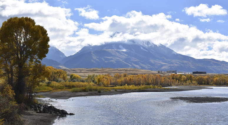 In this Oct. 8, 2018 file photo, emigrant Peak is seen rising above the Paradise Valley and the Yellowstone River near Emigrant, Mont. In this Oct. 8, 2018 file photo, emigrant Peak is seen rising above the Paradise Valley and the Yellowstone River near Emigrant, Mont.