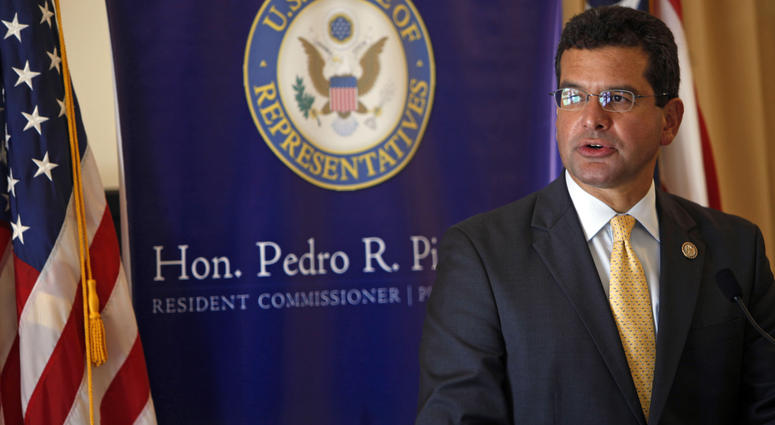 In this Sept. 24, 2013 file photo, Pedro Pierluisi, Puerto Rico's representative in the U.S. Congress, speaks during a conference in San Juan, Puerto Rico. In this Sept. 24, 2013 file photo, Pedro Pierluisi, Puerto Rico's representative in the U.S. Congress, speaks during a conference in San Juan, Puerto Rico.