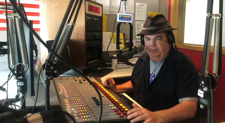 Months ago, Bremner had tried to establish if his listeners could agree on a fundamental question: what is racism? The answer, he realized, is no, we don't even agree on that. In this Friday, Aug. 2, 2019, photo, Scott Bremner, talk radio host, works in Erie, Pa.