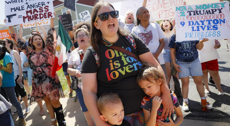 Demonstrators chant as they protest the arrival of President Donald Trump outside Miami Valley Hospital after a mass shooting that occurred in the Oregon District early Sunday morning, Wednesday, Aug. 7, 2019, in Dayton. Dayton shooting protesters