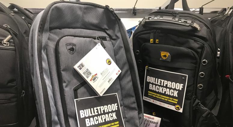 This Thursday, Aug. 8, 2019 photo shows bulletproof backpacks that for sale at an Office Depot store in Evanston, Ill. Bullet-resistant backpacks