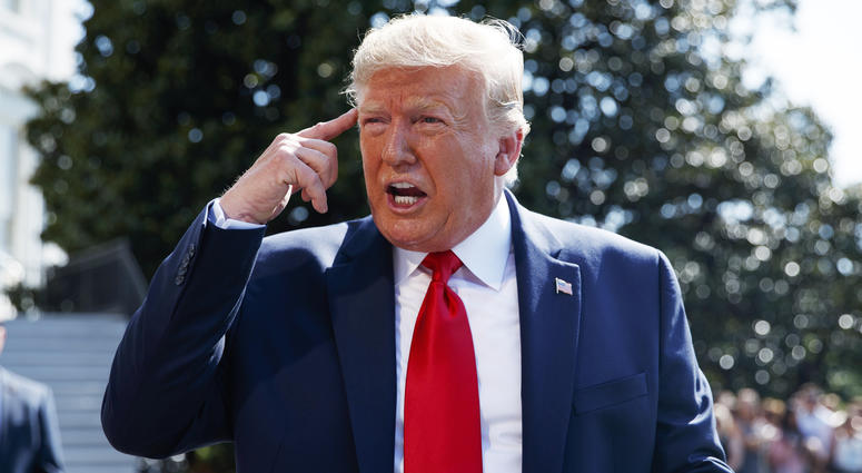 President Donald Trump talks to reporters on the South Lawn of the White House, Friday, Aug. 9, 2019, in Washington, as he prepares to leave Washington for his annual August holiday at his New Jersey golf club. President Donald Trump talks to reporters on the South Lawn of the White House, Friday, Aug. 9, 2019, in Washington, as he prepares to leave Washington for his annual August holiday at his New Jersey golf club.