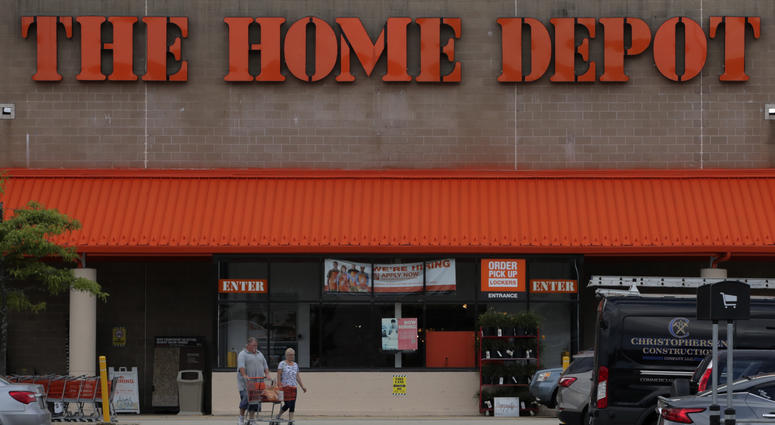 Shoppers leave the Home Depot store in Manchester, N.H., Thursday, Aug. 15, 2019. Shoppers leave the Home Depot store in Manchester, N.H., Thursday, Aug. 15, 2019.
