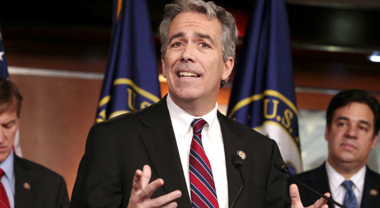 FILE - In this Nov. 15, 2011, file photo former U.S. Rep. Joe Walsh, R-Ill., gestures during a news conference on Capitol Hill in Washington. Ex-Rep. Joe Walsh making longshot GOP challenge to Trump