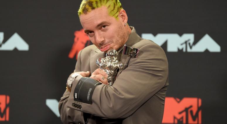 J Balvin poses in the press room with the award for best latin video for "Con Altura" at the MTV Video Music Awards at the Prudential Center on Monday, Aug. 26, 2019, in Newark, N.J. J Balvin poses in the press room with the award for best latin video for "Con Altura" at the MTV Video Music Awards at the Prudential Center on Monday, Aug. 26, 2019, in Newark, N.J.
