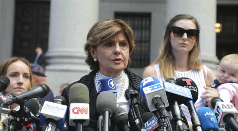 Attorney Gloria Allred, center, flanked by two of her clients, speaks during a news conference after leaving a Manhattan court where sexual victims, on invitation of a judge, addressed a hearing. 'Coward': Epstein accusers pour out their anger in court