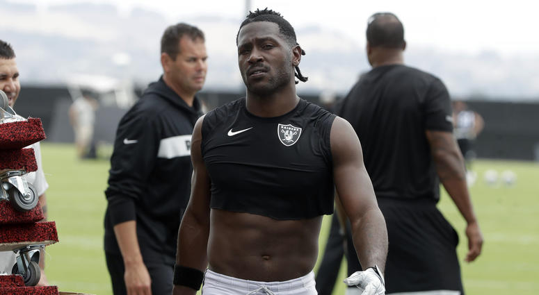 In this Aug. 20, 2019, file photo, Oakland Raiders' Antonio Brown walks off the field after NFL football practice in Alameda, Calif. Antonio Brown