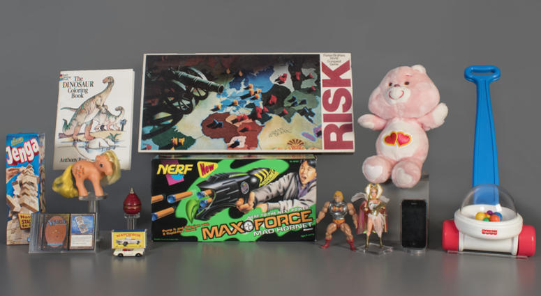 National Toy Hall of Fame 2019 finalists, from left to right: Jenga, Magic the Gathering, My Little Pony, Coloring Book, Matchbox Cars, Top, Nerf Blaster, Risk, Masters of the Universe, Care Bears, Smartphone, and Fisher-Price Corn Popper. National Toy Hall of Fame 2019 finalists
