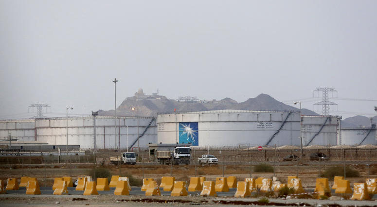 Storage tanks are seen at the North Jiddah bulk plant, an Aramco oil facility, in Jiddah, Saudi Arabia, Sunday, Sept. 15, 2019. Storage tanks at North Jiddah Aramco oil facility