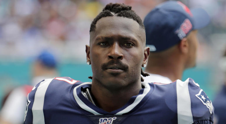 In this Sept. 15, 2019, file photo, New England Patriots wide receiver Antonio Brown (17) on the sidelines,during the first half at an NFL football game against the Miami Dolphins in Miami Gardens, Fla. The Patriots released Brown on Sept. 20, 2019. Antonio Brown