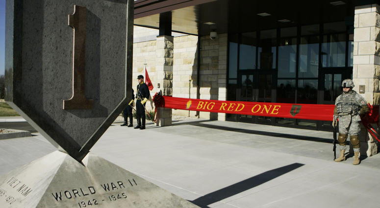 In this Feb. 9, 2015 file photo, an honor guard stands at the entrance before ribbon cutting ceremonies for the new 1st Infantry Division Headquarters at Fort Riley, Kan. 1st Infantry Division Headquarters at Fort Riley
