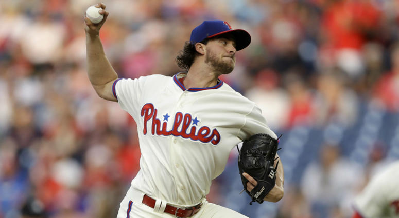 Philadelphia Phillies' Aaron Nola pitches during the third inning of a baseball game against the Colorado Rockies, Tuesday, June 12, 2018, in Philadelphia. Philadelphia Phillies' Aaron Nola