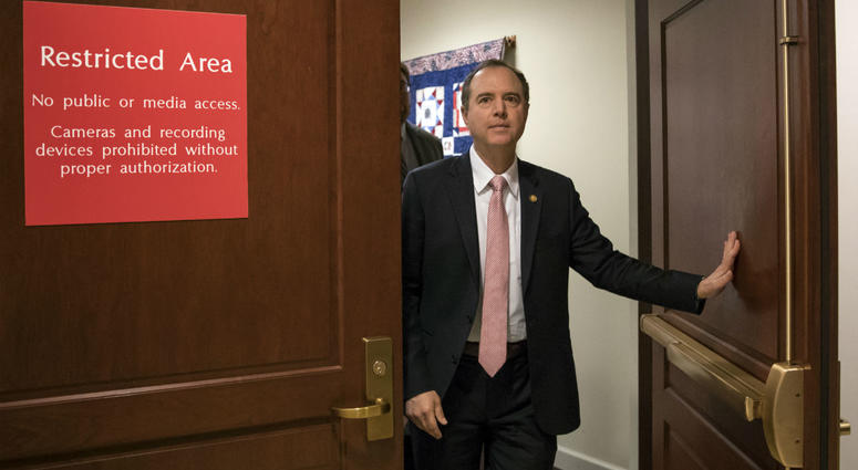 In this March 22, 2018 file photo, Rep. Adam Schiff, D-Calif., ranking member of the House Intelligence Committee, exits a secure area to speak to reporters, on Capitol Hill in Washington. In this March 22, 2018 file photo, Rep. Adam Schiff, D-Calif., ranking member of the House Intelligence Committee, exits a secure area to speak to reporters, on Capitol Hill in Washington.