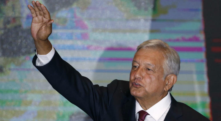 Presidential candidate Andres Manuel Lopez Obrador waves to supporters as he gives his first victory speech at his campaign headquarters in Mexico City, Sunday, July 1, 2018. Presidential candidate Andres Manuel Lopez Obrador waves to supporters as he gives his first victory speech at his campaign headquarters in Mexico City, Sunday, July 1, 2018.