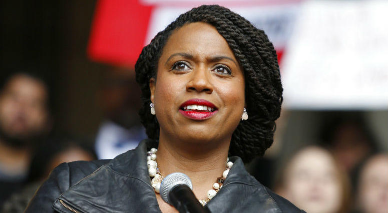 FILE - In this Oct. 1, 2018 file photo, Boston City Councilor Ayanna Pressley speaks at a rally at City Hall in Boston. On Nov. 6, Pressley became Massachusetts' first black woman elected to the U.S. House of Representatives.
