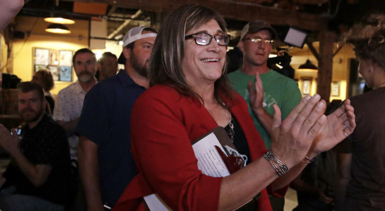 Vermont Democratic gubernatorial candidate Christine Hallquist, a transgender woman and former electric company executive, applauds with her supporters during her election night party in Burlington, Vt., Tuesday, Aug. 14, 2018. Vermont Democratic gubernatorial candidate Christine Hallquist, a transgender woman and former electric company executive, applauds with her supporters during her election night party in Burlington, Vt., Tuesday, Aug. 14, 2018.