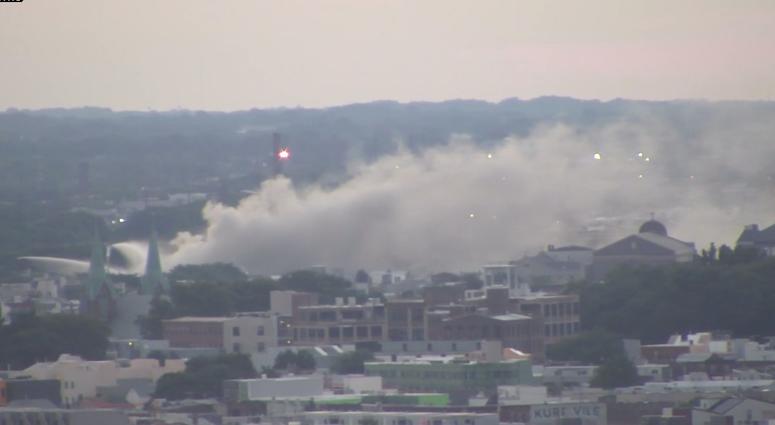 Smoke still pours from the scene of a huge junk yard fire in Kensington, Philadelphia. Smoke still pours from the scene of a huge junk yard fire in Kensington, Philadelphia.
