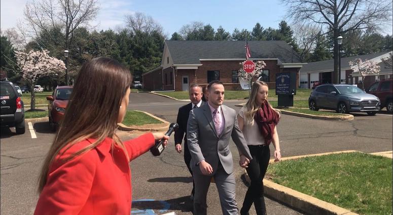 Matthew Aimers' wife held his hand on the way into his preliminary hearing in Northampton Township, April 11, 2019. He allegedly sexually assaulted a 17-year-old waitress at their wedding reception last November. Matthew Aimers