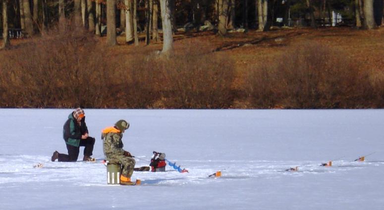 Men ice fish at Montgomery County's Green Lane Reservoir. Men ice fish at Montgomery County's Green Lane Reservoir.