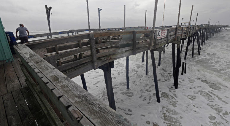 Waves crash under the Avalon Fishing Pier in Kill Devil Hills, N.C., Thursday, Sept. 13, 2018 as Hurricane Florence approaches the east coast. Waves crash under the Avalon Fishing Pier in Kill Devil Hills, N.C., Thursday, Sept. 13, 2018 as Hurricane Florence approaches the east coast.