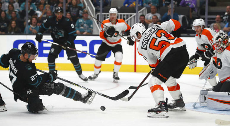 Philadelphia Flyers' Wayne Simmonds, left, takes a shot against San Jose Sharks goalie Martin Jones (31) during the second period of an NHL hockey game Saturday, Nov. 3, 2018, in San Jose, Calif.