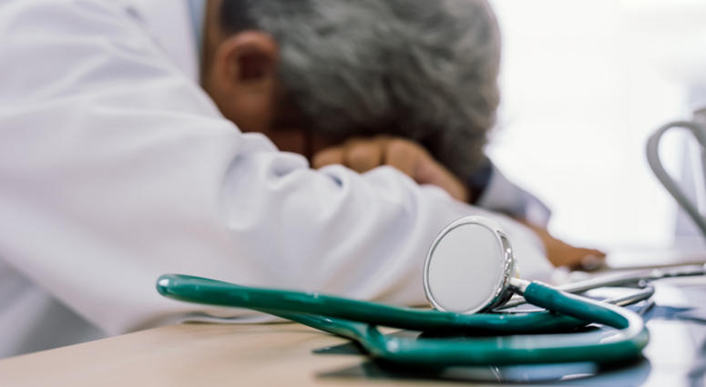 Tired doctor. Tired doctor.