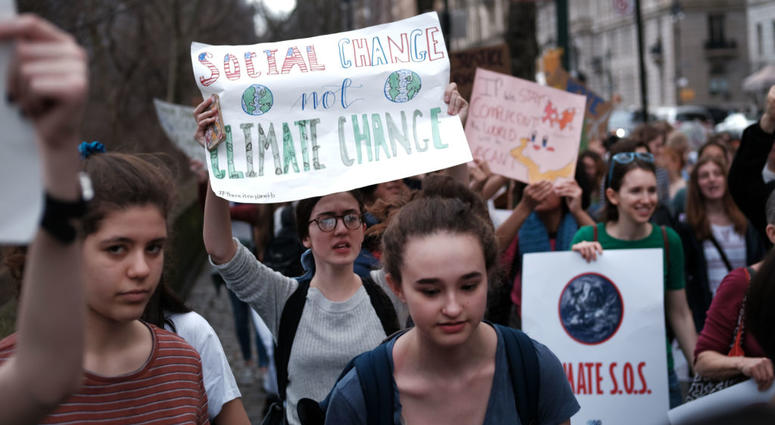 Students march to the Museum of Natural History to protest the lack of action on global warming and other climate related issues on March 15, 2019 in New York City. Youth Climate Strike