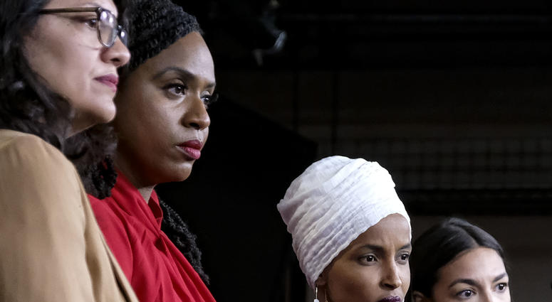 U.S. Reps. Rashida Tlaib (D-MI), Ayanna Pressley (D-MA), Ilhan Omar (D-MN), and Alexandria Ocasio-Cortez (D-NY) pause between answering questions during a press conference at the U.S. Capitol on July 15, 2019 in Washington, DC. U.S. Reps. Rashida Tlaib (D-MI), Ayanna Pressley (D-MA), Ilhan Omar (D-MN), and Alexandria Ocasio-Cortez (D-NY) pause between answering questions during a press conference at the U.S. Capitol on July 15, 2019 in Washington, DC.