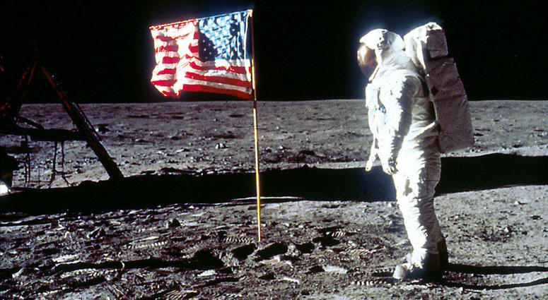 Astronaut Edwin "Buzz" Aldrin poses next to the U.S. flag July 20, 1969 on the moon during the Apollo 11 mission. Astronaut Edwin "Buzz" Aldrin poses next to the U.S. flag July 20, 1969 on the moon during the Apollo 11 mission.