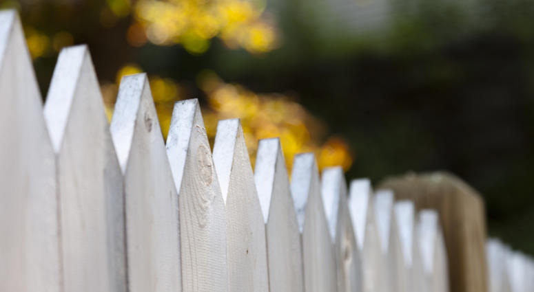 A fence between two homes. A fence between two homes.