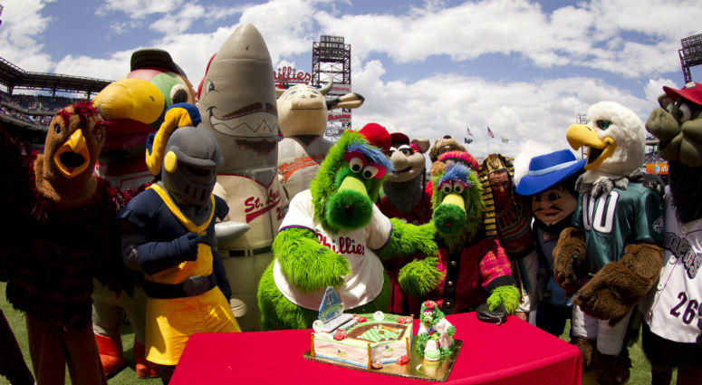 The Phillie Phanatic celebrates his birthday with other mascot friends prior to the game between the Cincinnati Reds and the Philadelphia Phillies on May 18, 2014 at Citizens Bank Park in Philadelphia. Mascots